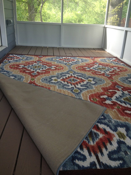 extending our living space outdoors, flooring, outdoor living, Mohawk uses marine backing on these rugs which is just like boat carpet It lets the water pass through allowing it to dry faster