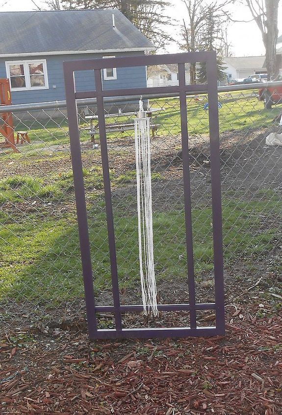 my repurposed garden, gardening, repurposing upcycling, This repurposed cupboard door is awesome in purple with a hand made solar lite shower Beautiful at nite