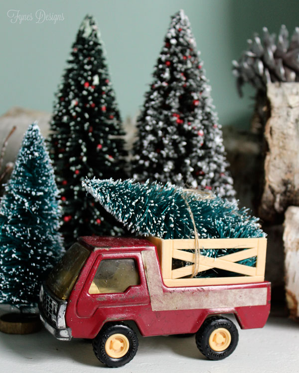 sights of the season from fynes designs, christmas decorations, seasonal holiday decor, Vintage truck hauling around a bottle brush tree