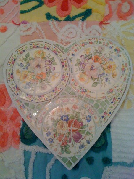these are a few of my mosaic hearts i do them as a hobby i love hearts, crafts, home decor