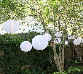 early fall outdoor party ideas, hydrangea, outdoor living, seasonal holiday decor, White lanterns in trees