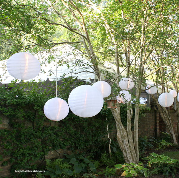 early fall outdoor party ideas, hydrangea, outdoor living, seasonal holiday decor, White lanterns in trees
