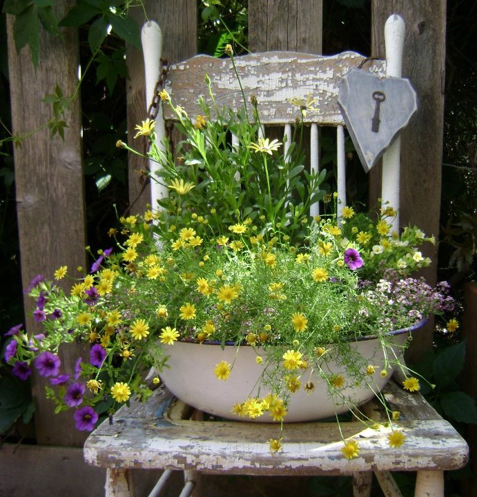 sitting pretty in the garden, gardening, repurposing upcycling, Marie Niemann s sensational chair chippy flowery and with her signature a key inside a heart
