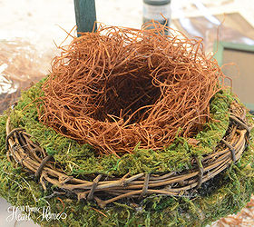spring welcome for michaels hometalk pinterest party, chalkboard paint, crafts, easter decorations, seasonal holiday decor, wreaths, Using straw filler found in the floral design section of your craft store make a little bird nest by gently forming and hollowing out the center tuck it into the center of the wreath no need to glue it fits right in
