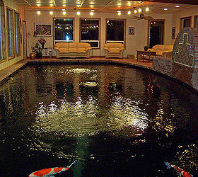 i designed and built this koi pond for my clients show fish it is over 39 000, The pond is approximately 17 X 40 and it s a wonderful room to spend winter months in watching the kids swim The pond is over 9 feet deep and was build as a swimming pool to pass all the WA state codes