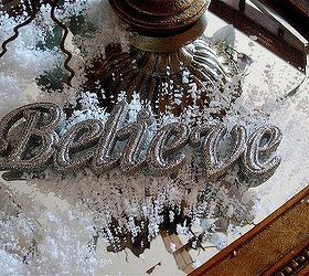 a winter vignette, christmas decorations, seasonal holiday decor, I sprinkled a little more fake snow on a gold mirror and set another Christmas ornament with it s hanger removed in the snow