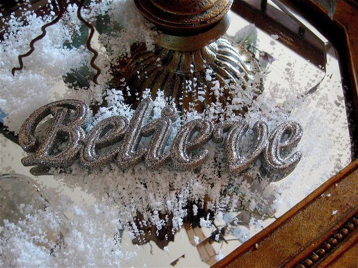 a winter vignette, christmas decorations, seasonal holiday decor, I sprinkled a little more fake snow on a gold mirror and set another Christmas ornament with it s hanger removed in the snow