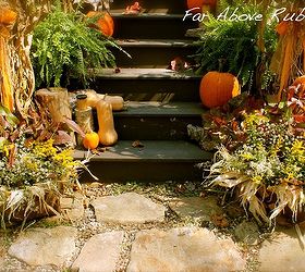 organic fall porch in the country, outdoor living, seasonal holiday decor, Farm baskets filled with wildflowers weeds branches and corn shucks replace mums as a fall accent