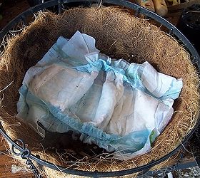 top 10 easy backyard ideas for entertaining, Put diapers in the bottom of your potted plants This trick helps the plants retain moisture and will keep them fresh longer Cover the diapers with burlap material so that they are not visible