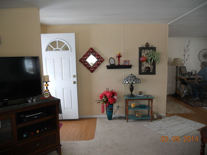 q living room wall ideas, home decor, living room ideas, wall decor, With the door open from my chair tv on left little wall and at the right end of picture is the main living room wall So I don t think it looks so unbalanced from my chair But I agree adjust the mirror at least