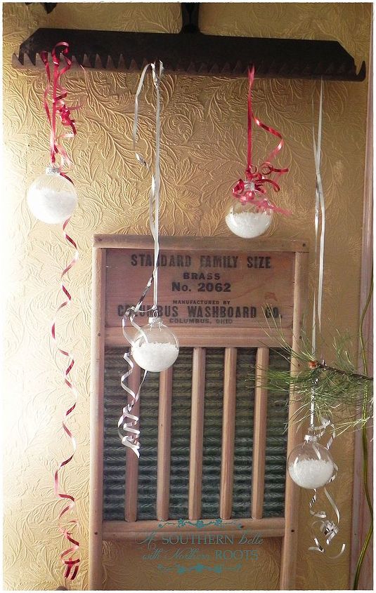 christmas decor, christmas decorations, crafts, mason jars, seasonal holiday decor, snow filled bulbs hanging from a rake