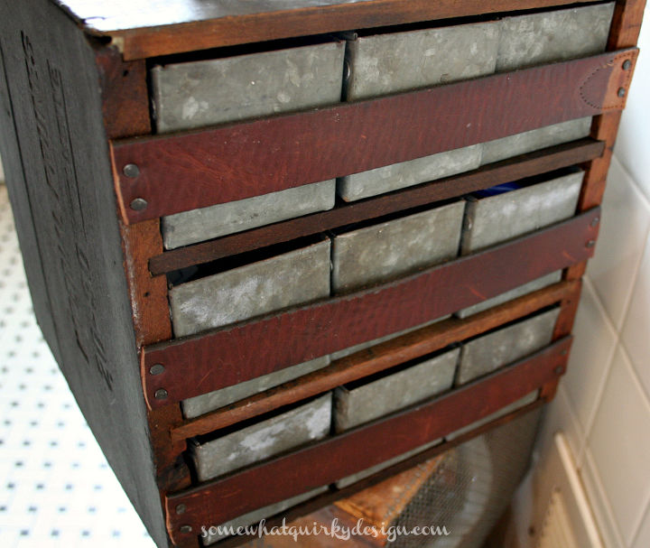 i repurposed this little storage cubby to use in my bathroom, bathroom ideas, repurposing upcycling, storage ideas, The drawers fell out of the back so I cut up a belt and tacked it across Works like a charm