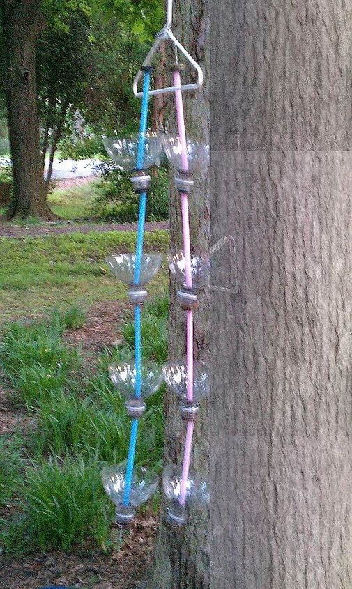 recycled soda bottles as hanging seedling rain chains, I used 4 bottle tops trimmed nicely with scissors 4 large drinking straws 16 1 5 2 or 4 hole buttons 3 yards of 22 gauge floral wire per rain chain It s really simple to do it doesn t take long I already had all of the stuff