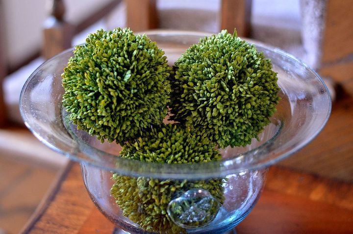 small changes in the entryway, foyer, home decor, Faux greenery balls in a blue seeded glass bowl