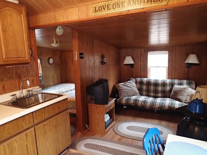 small cabin leave it wood or go with paint and beadboard, Little cabin living area and peek into the sleeping area