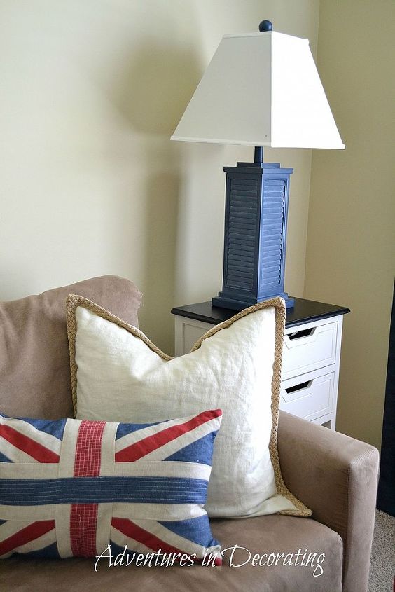 my little man s playroom grows up just a tad, entertainment rec rooms, home decor, A Union Jack pillow provides a pop of color on his soft chocolate microfiber sofa
