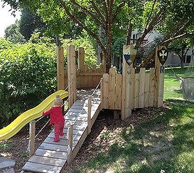 diy build your kids a play castle, diy, outdoor living, woodworking projects, Finished product with slide ramp and hammock
