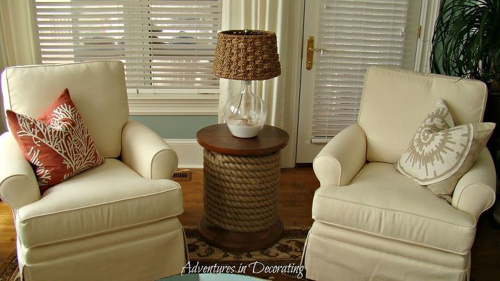 my parents sunroom that i recently redecorated, home decor, living room ideas, Fun spool table from Ballards paired with a fun glass lamp from Pottery Barn I chose four of these comfy swivel rockers from Capri Furniture