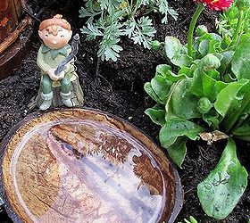 a fire pit fairy garden two versions choose your favorite, crafts, gardening, repurposing upcycling, Half a coconut shell becomes a fishing hole