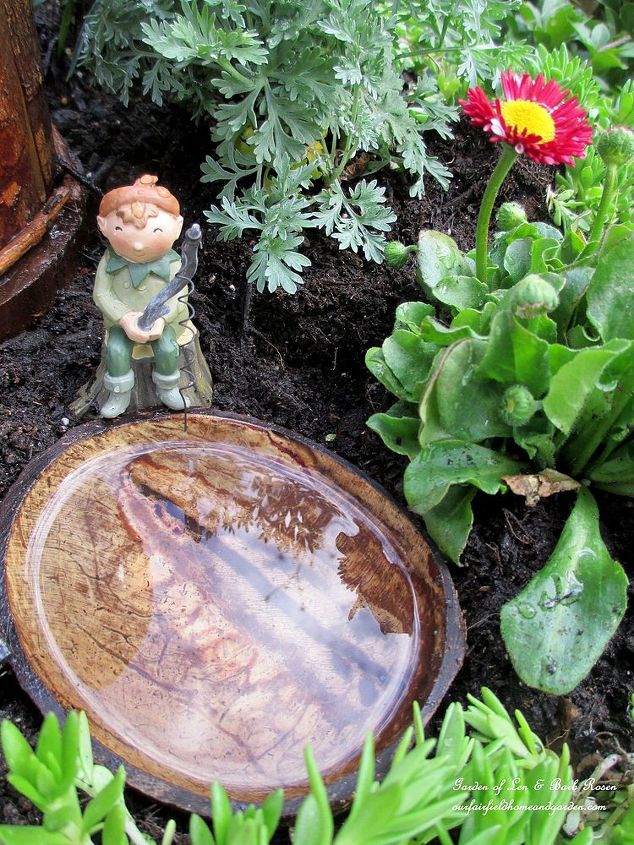 a fire pit fairy garden two versions choose your favorite, crafts, gardening, repurposing upcycling, Half a coconut shell becomes a fishing hole