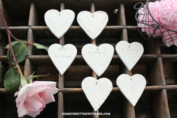 diy clay valentine hearts banner, crafts, seasonal holiday decor, valentines day ideas, Before you bake the Sculpey clay be sure to make a hole on top to add string to it later