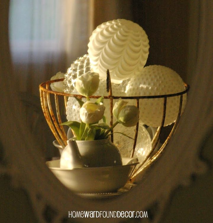 glass lamp globe snowballs, crafts, home decor, a collection of glass lamp globes in a wire urn is a simple and beautiful winter decoration reminiscent of snowballs