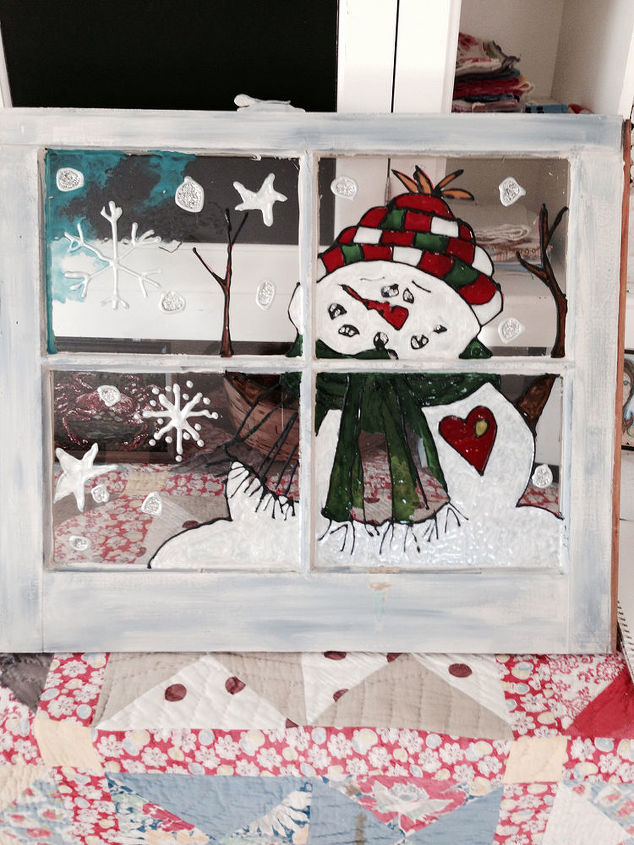 snowman painted in stain glass paint on old window, In process