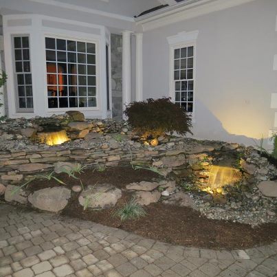 our most recent project pondless waterfall rainxchange system, doors, outdoor living, ponds water features, A little lighting and the mood is set