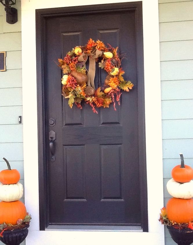fall porch, porches, seasonal holiday decor, wreaths, Topiaries flanking the front door