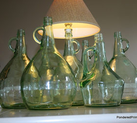 turning thrift store wine bottles into lamps, lighting, repurposing upcycling, A simple lamp kit transforms these beautiful bottles into a lamps