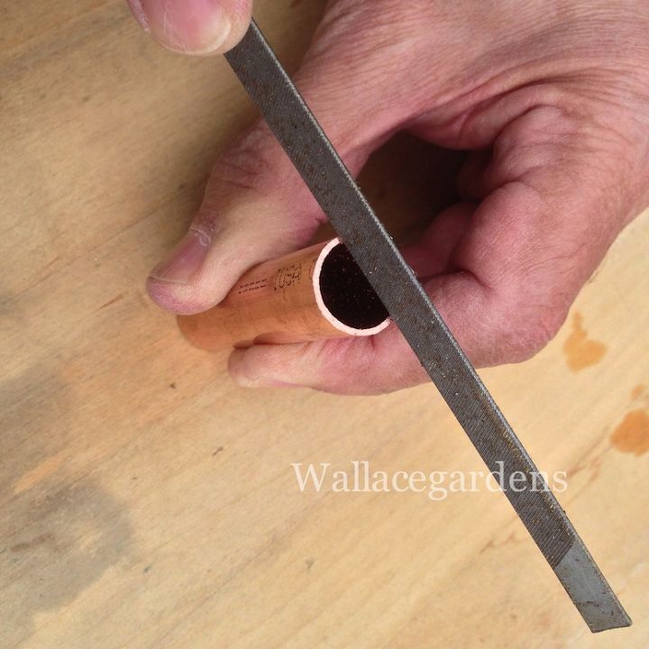 wine bottle watering device with copper tubing for container gardens