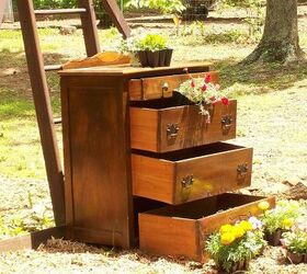flower chest of drawers with granddaughter, flowers, gardening, repurposing upcycling, Then filled good with dirt and got to planting
