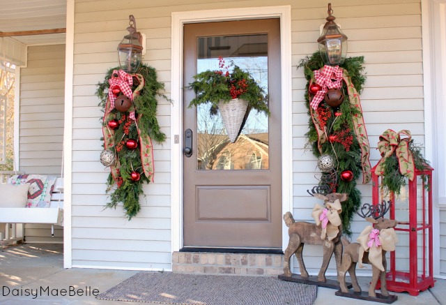 decorating my front porch for christmas, christmas decorations, porches, seasonal holiday decor, I created large swags to hang from the light fixtures