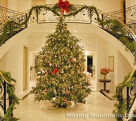 should you list your home for the holidays yes but keep the decorations simple and, fireplaces mantels, real estate, seasonal holiday d cor, wreaths, A larger home can be festive but this is just enough holiday decor for buyers to see when first entering the home