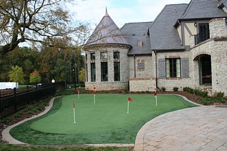 putting greens, landscape, outdoor living, The home matches the golf look