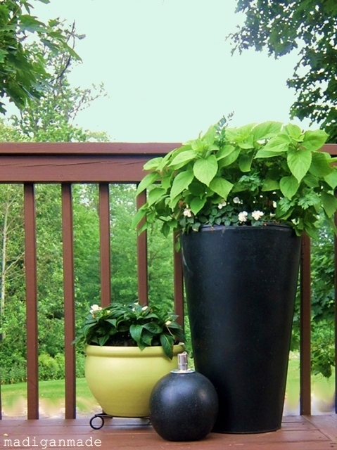an inexpensive bright green outdoor update, decks, outdoor furniture, outdoor living, painted furniture, A mix of green and black pots