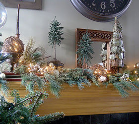 christmas mantle, seasonal holiday d cor, The redesigned mantle to match the Christmas tree using gold silver and white ornaments to reflect the lights