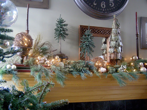 christmas mantle, seasonal holiday d cor, The redesigned mantle to match the Christmas tree using gold silver and white ornaments to reflect the lights