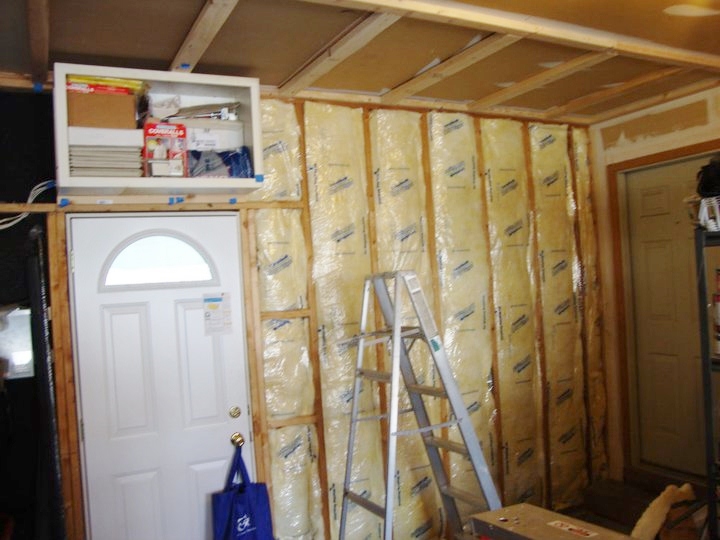 renovate area between house to sunroom through the garage, garages, wall decor, Framed the ceiling for new drywall mounted our first cabinet purchased at Community Forklift a reclaim repurpose store 5 cabinets in great shape for under 200 00