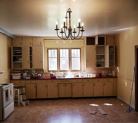 kitchen renovation in 1918 farmhouse, home decor, kitchen backsplash, kitchen design, living room ideas, Before 1950 s disfunctional cabinets all on one wall No ventilation and old uninsulated windows and walls