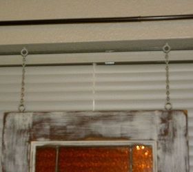 cabinet door, crafts, doors, home decor, repurposing upcycling, window treatments, Eye screws placed in the frame of the cabinet door and in the top of the window plus 5 of white chain and I have a nice window treatment