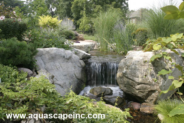 refresh your landscape with water, gardening, outdoor living, ponds water features, Careful placement of rocks help the water feature appear as though it s always existed in the landscape
