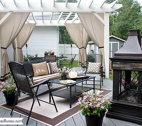 back deck makeover pergola reveal, decks, fireplaces mantels, outdoor furniture, outdoor living, painted furniture, A look at the space as a whole