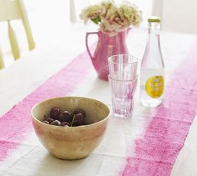 7 diy projects under 20, crafts, repurposing upcycling, Dip dye table runner Brighten up your table with this simple project The creative geniuses over atSweet Paul Magazine have proved that all it takes to spice up your next dinner party is a box of Rit dye and an unloved table runner