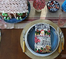 candy land christmas tablescape, christmas decorations, crafts, seasonal holiday decor, A candy covered gingerbread house is the centerpiece
