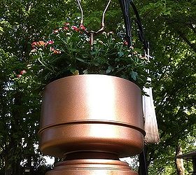 brass lamp finds new life as hanging planter, flowers, gardening, repurposing upcycling, The trick was to find a flower basket that was just tall or short enough to fit inside without seeing a large portion of the pot