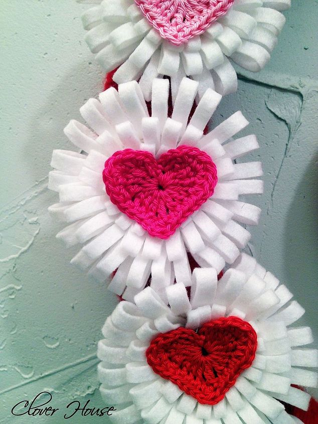 yarn felt valentine wreath, crafts, seasonal holiday decor, valentines day ideas, wreaths, Crocheted hearts just to add a touch of color tot he white flowers