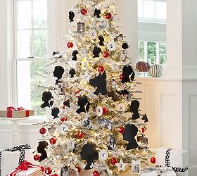 christmas trees 6 ways, seasonal holiday d cor, Family Memory Highlighting the importance of family this graphic tree a beautiful pre lit flocked version is anchored by hand cut silhouettes of family members even the dog Small wood frames feature everyone s initials