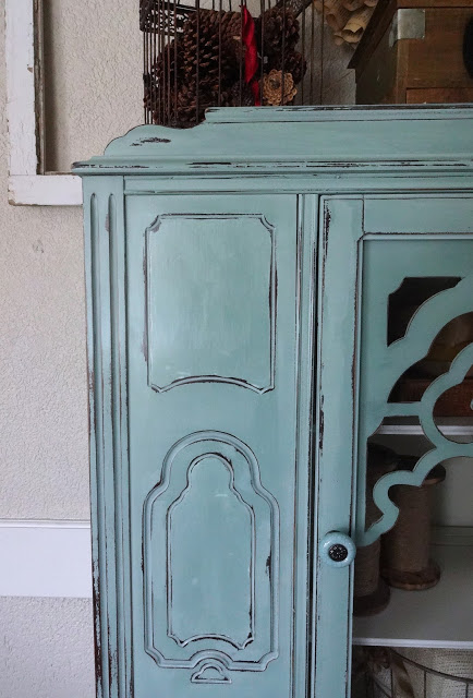 painted antique hutch, painted furniture, I distressed with a damp rag