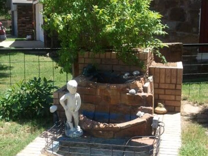 q what can i plant in my containers attached to my fountain, container gardening, flowers, gardening, outdoor living, My fountain that I am working on Need ideas for the right and left container beds